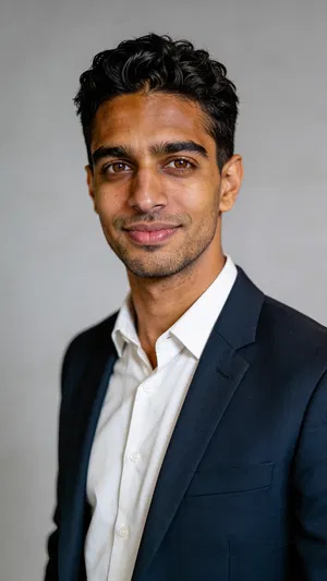 Consistent character in classic gray studio corporate headshot