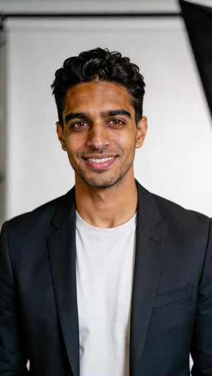 Consistent character studio headshot on light gray backdrop