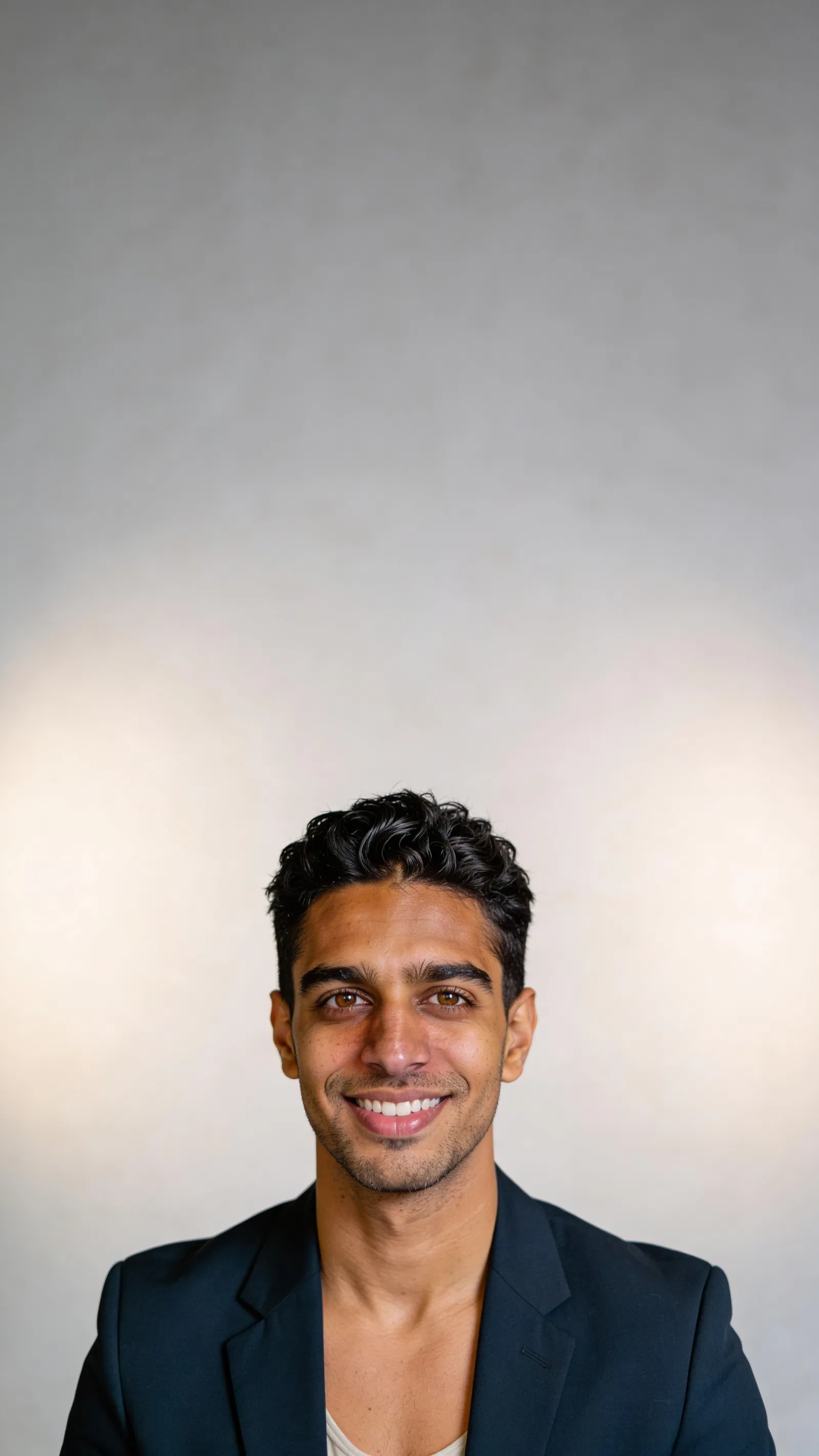 Consistent character studio headshot with blazer and soft gray background