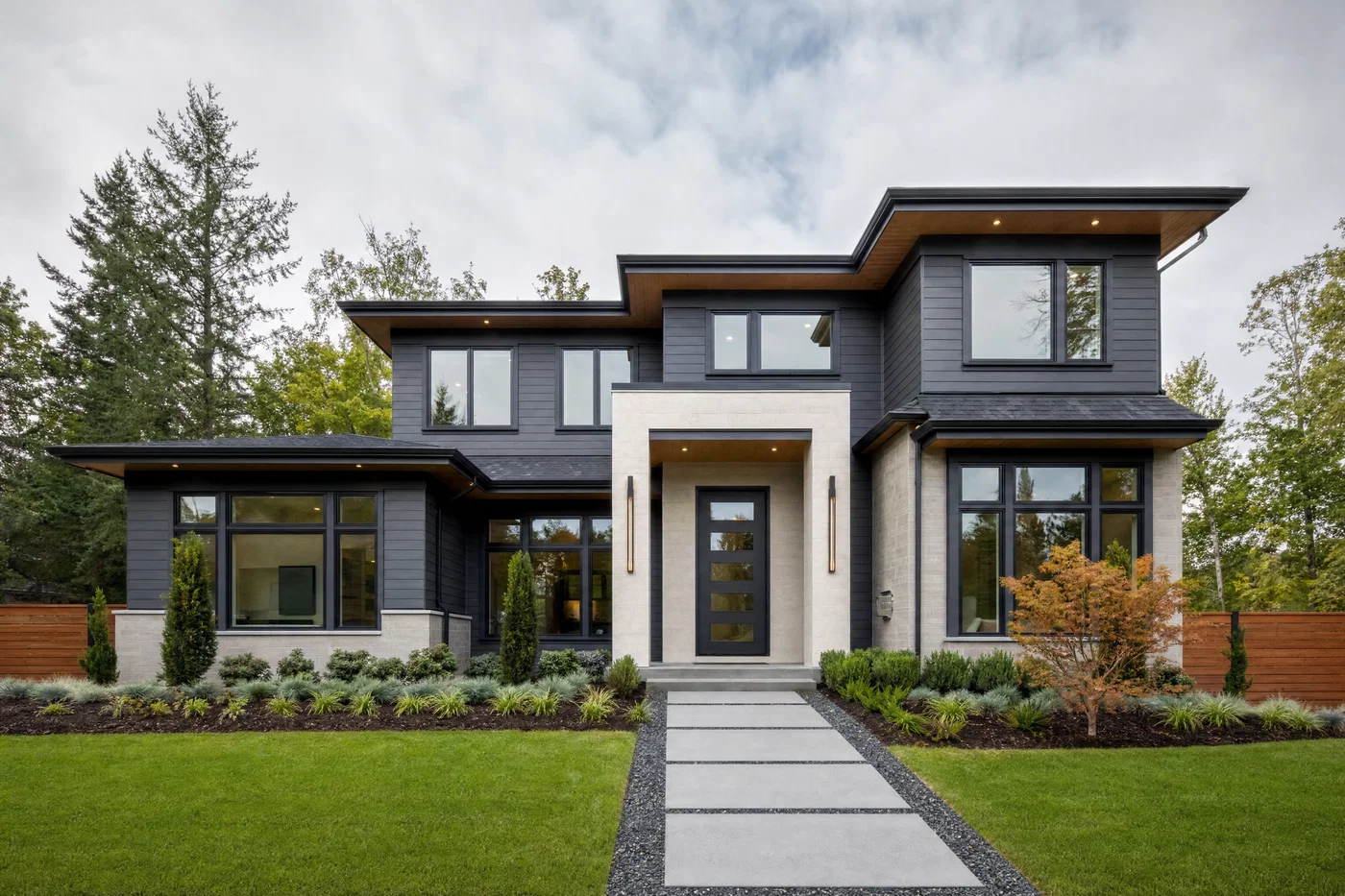 Modern home exterior photographed wide with straight verticals, soft daylight, and balanced HDR sky detail.