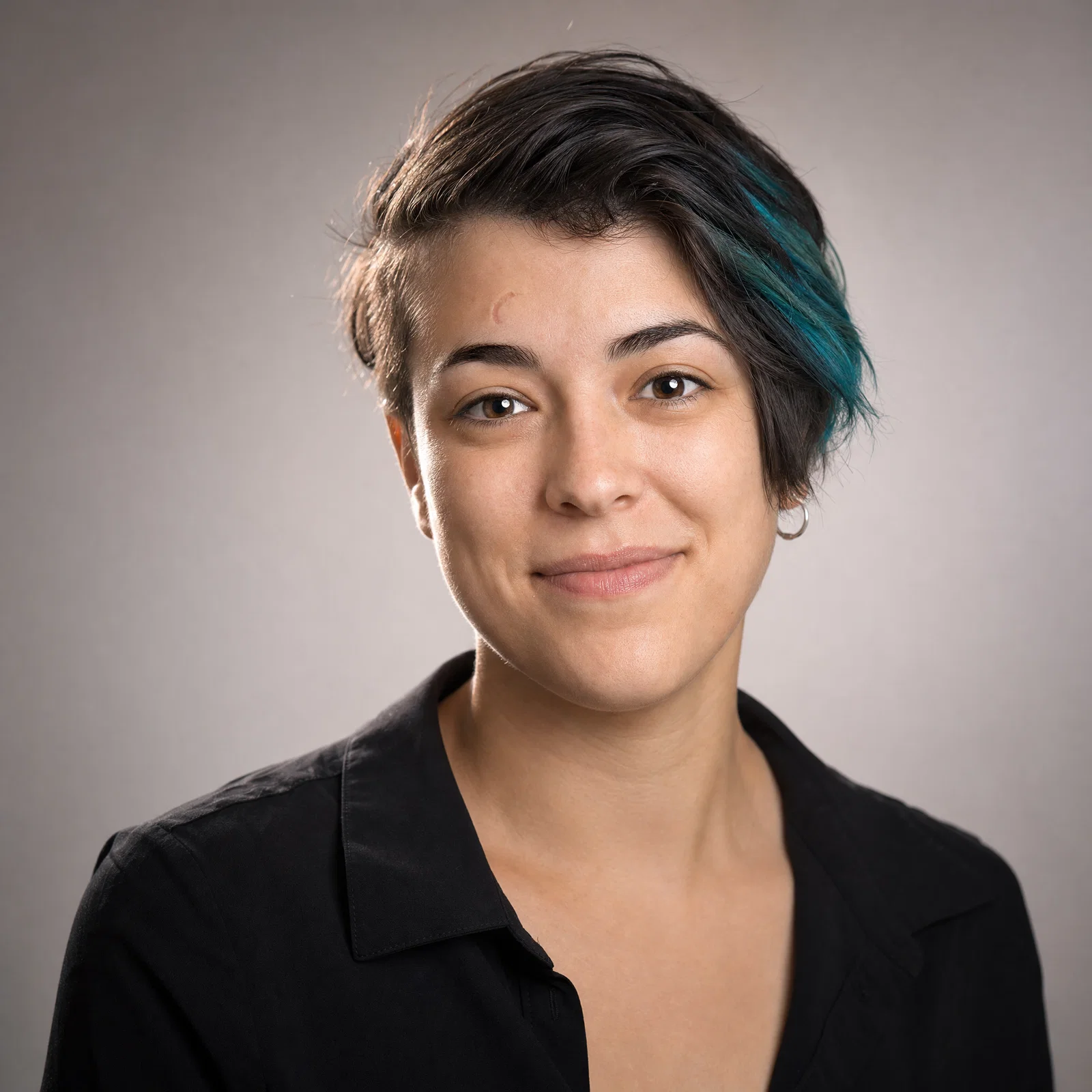 Realistic studio headshot centered for a circular profile picture crop.