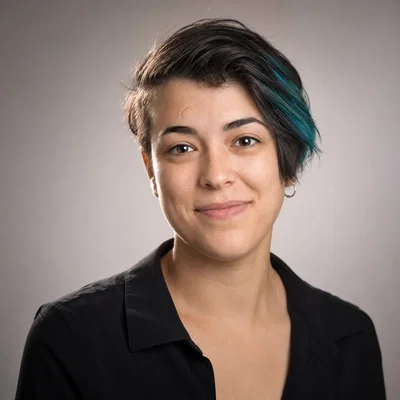 Realistic studio headshot centered for a circular profile picture crop.