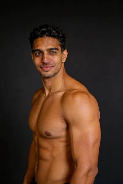 Same male bodybuilder side chest pose, 3/4 body