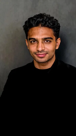 Same man after barbershop lineup, confident grooming-based looksmaxxing portrait