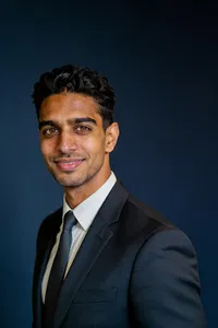 Same person, executive studio headshot