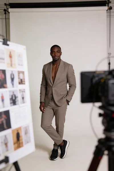 Same person full-body in creative studio for creator branding photos