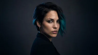 Three-quarter portrait designed for a circular avatar crop with clean studio lighting.